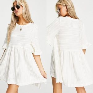 Free People take a spin tunic top with frill sleeves in textured stripe Size M